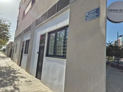a building with a door on the side of a street at Romantic Apartment N2 Oceanografico Virkin Suites in Valencia
