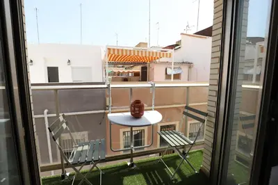 a view of a balcony with a table and chairs at Tranquilo y delicioso rincón junto al mar in Puerto de Sagunto