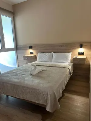 a bedroom with a large bed with white sheets and pillows at OPTIMUS COMFORT Campoamor 101 in Valencia