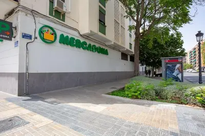 a sign on the side of a building at Loft nuevo cerca de Ruzafa y Ciudad de las Artes in Valencia