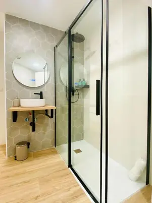 a bathroom with a shower and a sink at BAJO A - Design & Comfort in Ruzafa SOHO in Valencia