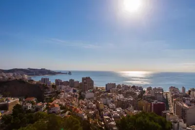 an aerial view of a city and the ocean at Cullera Horizon Apartment in Cullera