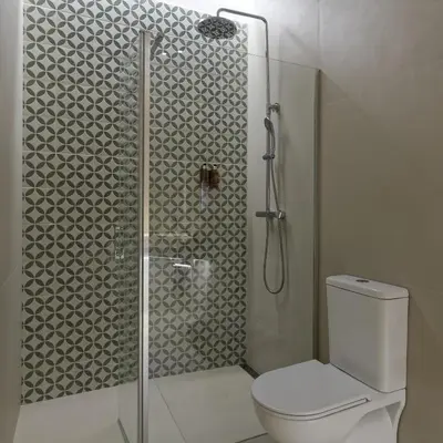 a bathroom with a glass shower with a toilet at Osito Hub - Esteban Ballester in Valencia