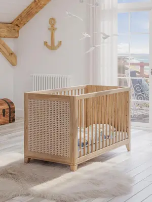 a wooden crib in a room with a window at ALZIRA BONiTA SUITE ViP jacuzzi in Alzira