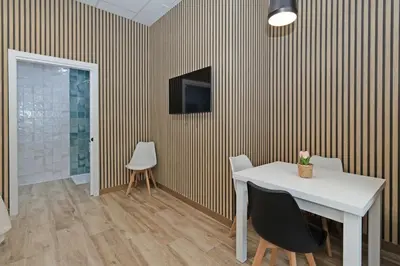 a dining room with a white table and chairs at GuestReady - Delightful Valencian Stay in Valencia
