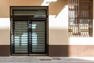 a door to a building with a window at Apartment Teo in El Carmen in Valencia