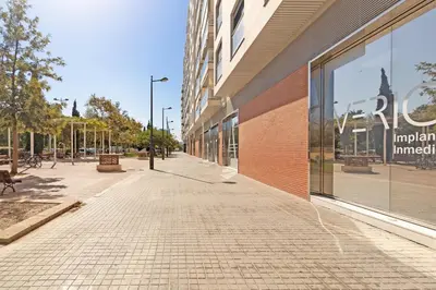 an empty sidewalk in front of a building at GuestReady - Lovely flat with views in Valencia in Valencia
