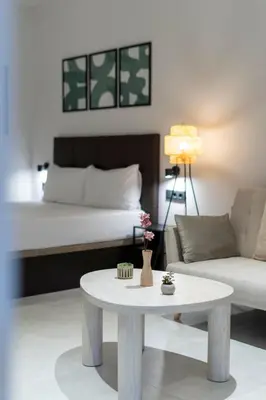 a living room with a coffee table and a bed at VLC HOST - Luz Casanova in Valencia