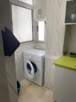 an empty refrigerator with its door open in a kitchen at Tranquila y Céntrica Habitación Individual en Vivienda Compartida in Valencia