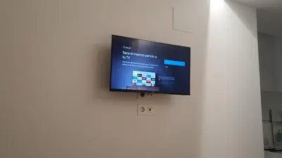 a bedroom with a bed and a television in it at Tranquila y Céntrica Habitación Individual en Vivienda Compartida in Valencia