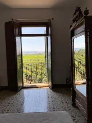 a room with an open door with a view at Casa Rural Huerto del Carmen in Puebla Larga