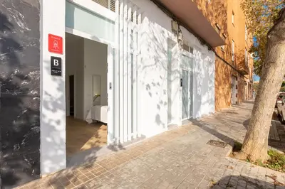 a building with a sign on the side of a street at Estudio Marina Ivana in Valencia