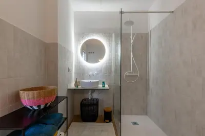 a bathroom with a sink and a shower at Estudio Marina Ivana in Valencia