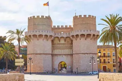 a castle with a flag on top of it at Ruzafa experience Oceanografic ciencias in Valencia