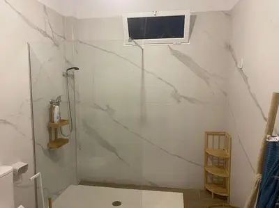 a bathroom with a shower with a glass door at Ruzafa experience Oceanografic ciencias in Valencia