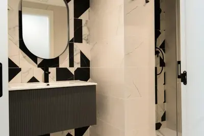 a bathroom with a sink and a mirror at Forata lofts in Valencia