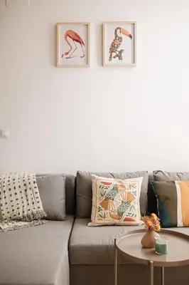 a living room with a couch and a table at Lofts plaza JM Orense B in Valencia