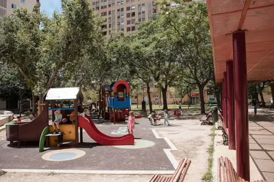 a playground in a park with children playing on it at Lofts JM Orense D Amplio y cercano a la playa in Valencia