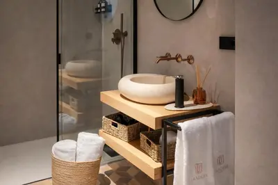 a bathroom with a sink and a mirror at Tradere Hotel Boutique in Moncada