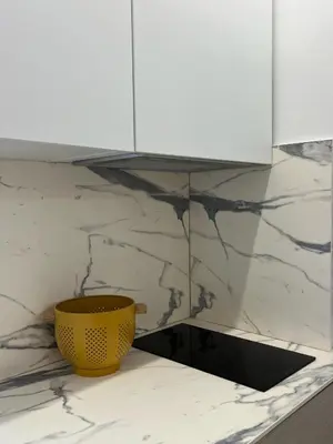 a yellow bowl sitting on top of a kitchen counter at loft con wifi lavadora secadora cama agradable muy proximo valencia in Benimamet