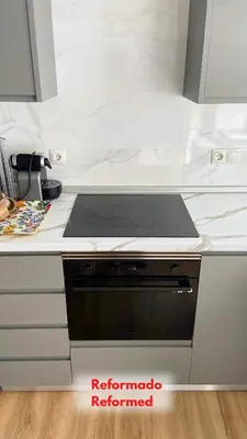 a kitchen with a stove top oven in a kitchen at Apt Cabanyal, Beach 8 Min, Terrace, Smart TV in Valencia