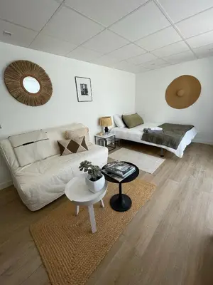 a living room with a couch and a table at CASA Silvestre in La Eliana