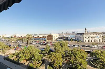 an aerial view of a city with a parking lot at GuestReady - Piso moderno con vistas a la Marina in Valencia