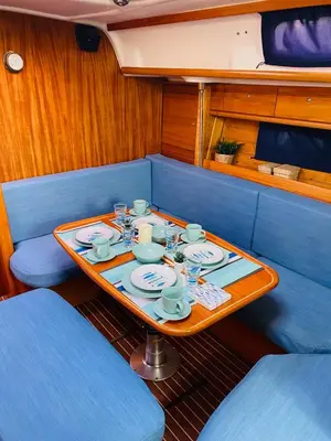 a table with cups and saucers on a boat at Velero en puerto de valencia in Pinedo