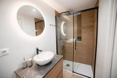 a bathroom with a sink and a shower at Lofts plaza JM Orense C in Valencia