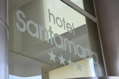 a sign on the window of a hotel room at Hotel Santamarta in Cullera