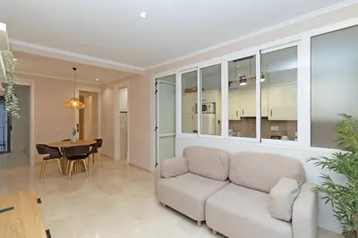 a living room with a couch and a table at GuestReady - Urban retreat in Valencia in Valencia