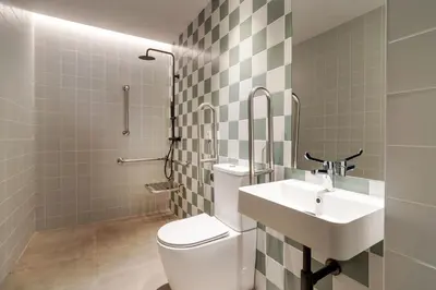 a bathroom with a white toilet and a sink at VLC HOST - Reina 168 in Valencia