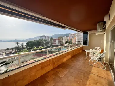 a balcony with a view of the water at Florazar 2 Apartamento frente al mar en Cullera in Cullera