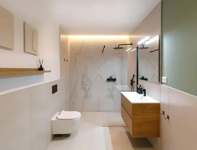a bathroom with a toilet and a sink and a shower at Stylish apartment near Old town & Turia park in Valencia