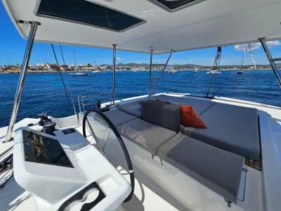 a bed on the back of a boat on the water at Patagonia in Valencia
