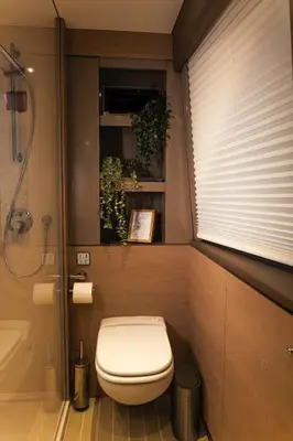 a small room with a bed in the background at Luxury Catamaran Stay in Valencia Marina in Valencia