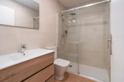 a bathroom with a shower and a toilet and a sink at VLC HOST - Molinell in Valencia