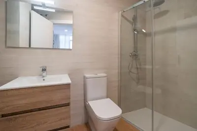 a bathroom with a toilet and a sink and a shower at VLC HOST - Molinell in Valencia
