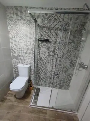 a bathroom with a shower and a toilet at Casa Rebel in Chelva