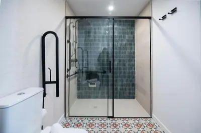 a shower with a glass door in a bathroom at District Key - Valencia, Olimpia 2 in Valencia