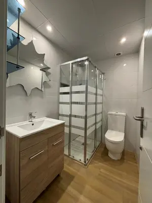 a bathroom with a shower and a sink and a toilet at Casa Rural El Mediterraneo Complejo Rural El Colmenar in Chóvar