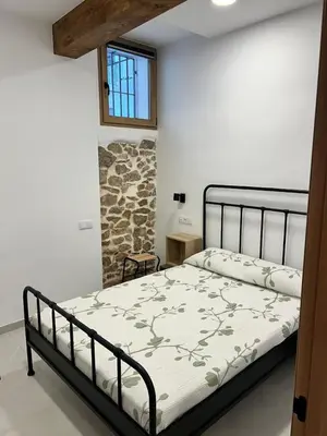 a bedroom with a bed in a room at Apartamento La Fragua - A ESTRENAR - BRAND NEW in Chulilla