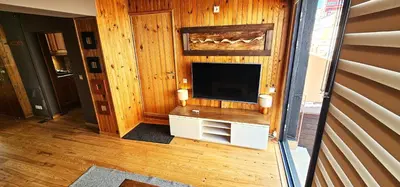 a living room with a flat screen tv on a wall at Vacansis Atico Loft El Mercat in Valencia