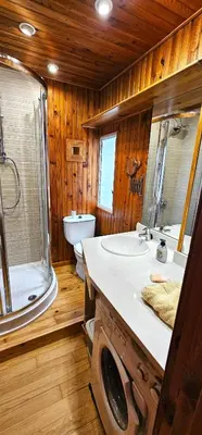 a bathroom with a sink and a shower and a toilet at Vacansis Atico Loft El Mercat in Valencia