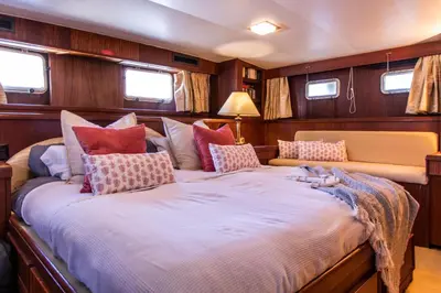 a large bed in the back of a boat at Hotel Yacht Our Alissa in Valencia