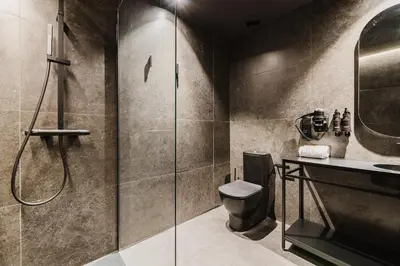 a bathroom with a shower and a toilet at Hotel Arena Select in Valencia