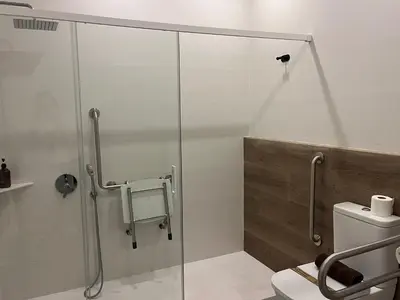 a shower stall in a bathroom with a toilet at Apartments Vent de Vela in Valencia