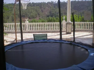a view of a basketball hoop from a window at La Casa de la Cascada in Anna