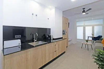 a kitchen with a sink and a counter top at GuestReady - A lovely studio in la Saidia Valencia in Valencia
