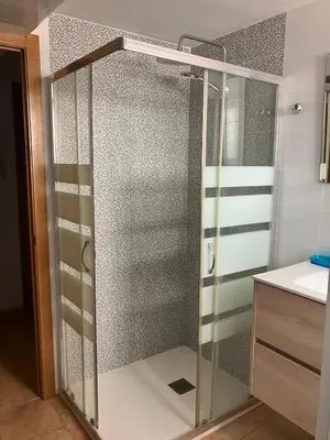 a bathroom with a shower and a sink at Cullera Marisa in Cullera
